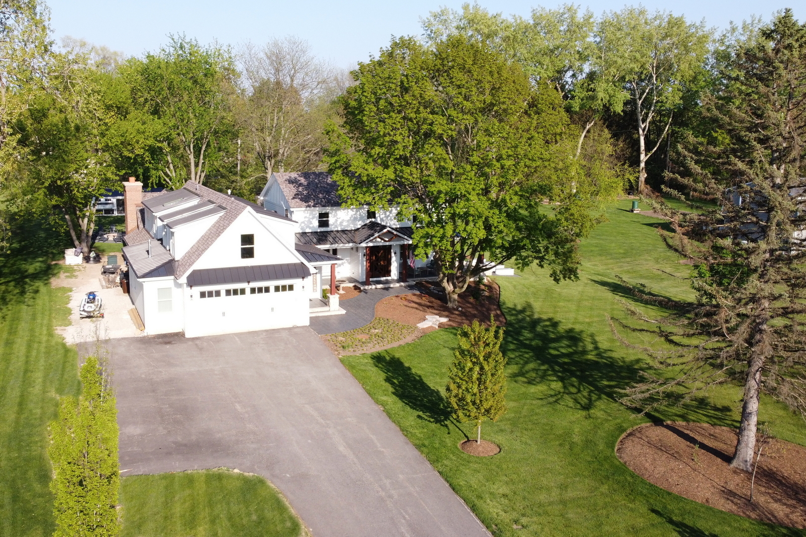 2238 Hanlon Road Libertyville, IL 60048 - Photo 43 of 72 a view of a house with a yard and garden