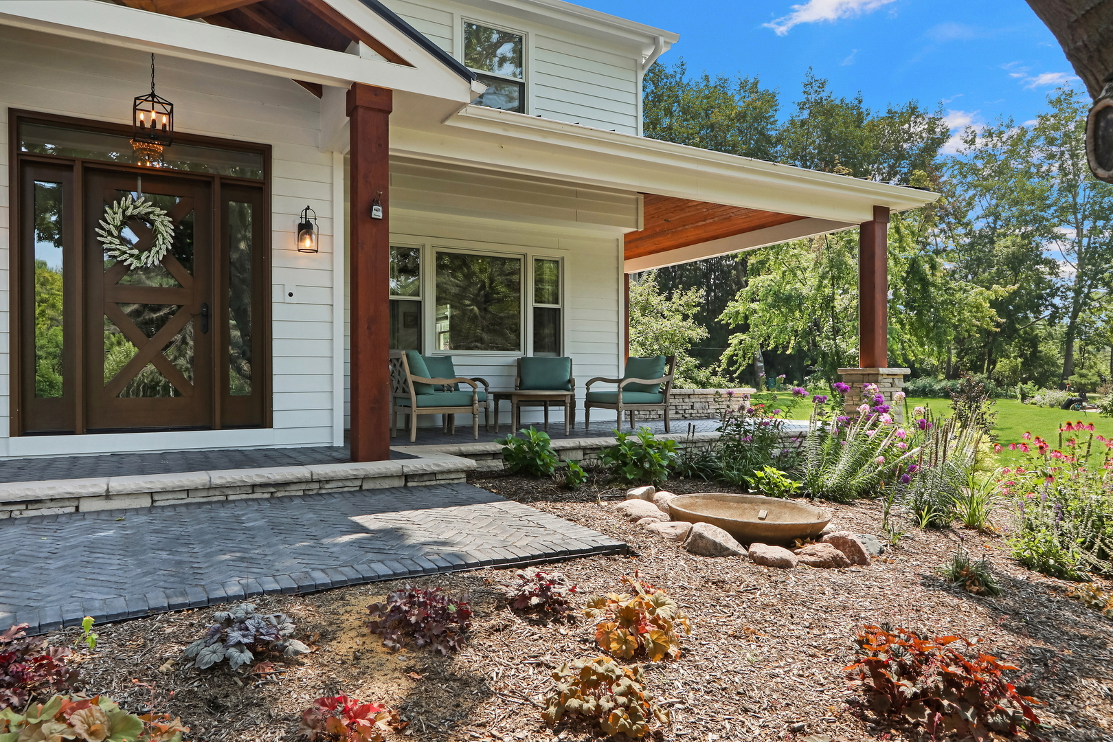 2238 Hanlon Road Libertyville, IL 60048 - Photo 66 of 72 a view of a house with backyard porch and sitting area