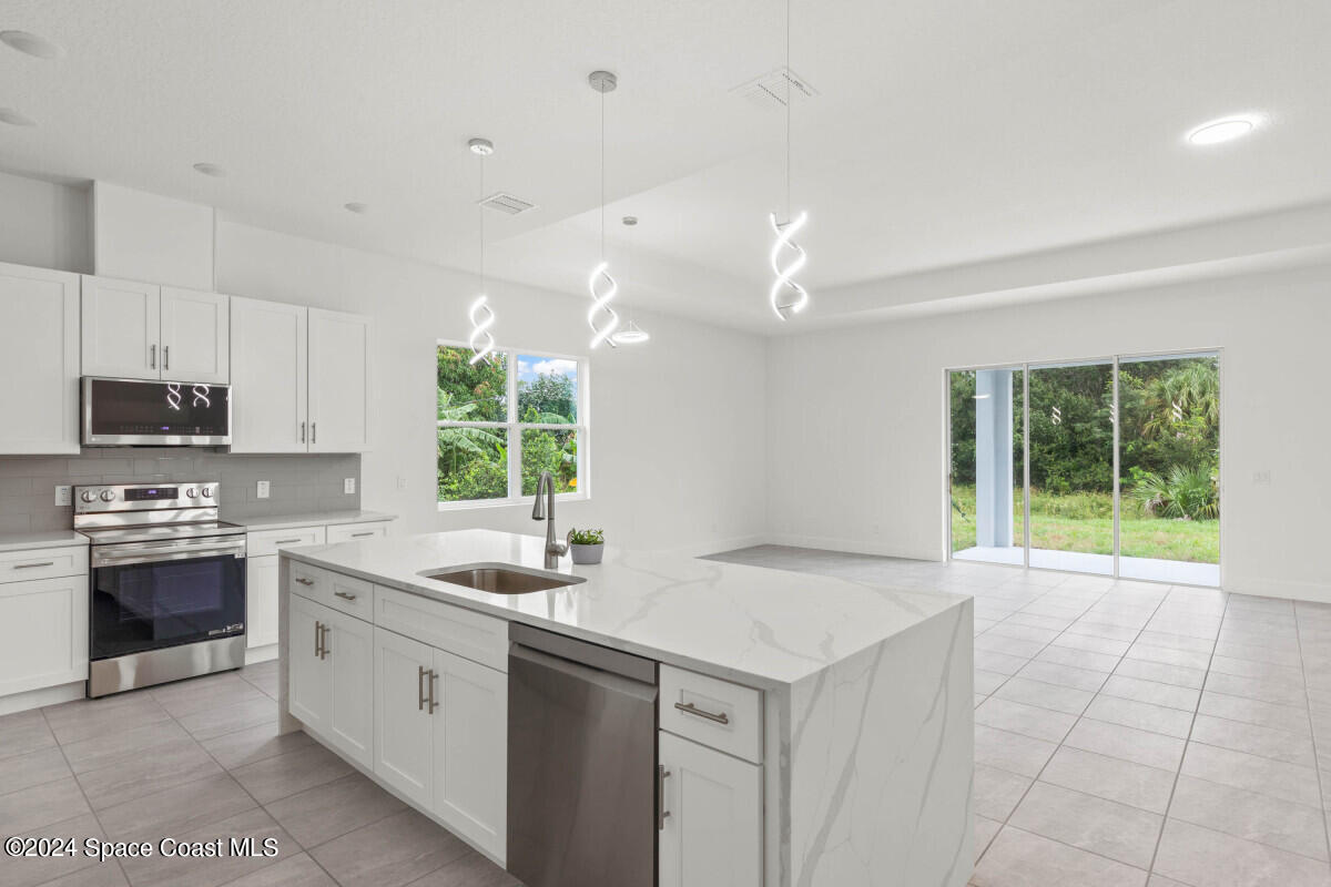 1127 Johnston Road Southeast Palm Bay, FL 32909 - Photo 7 of 24 7