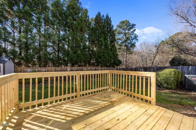 a view of a wooden roof deck