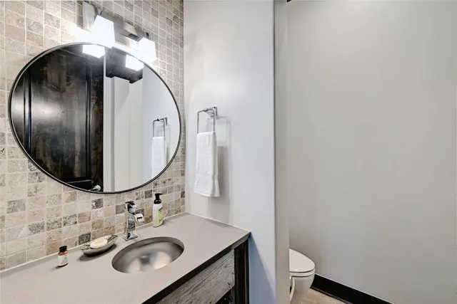 a room with furniture pool table and flat screen tv