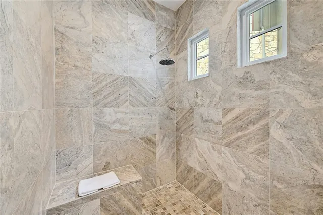 a bathroom with a double vanity sink mirror and double