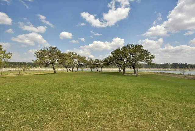 a view of a swimming pool with an outdoor space and seating area