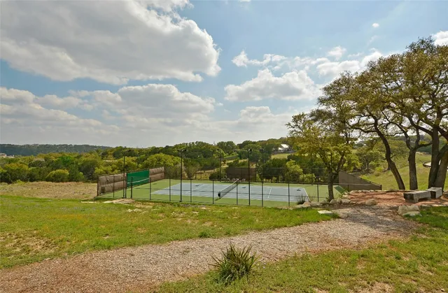 a view of a golf course with a lake