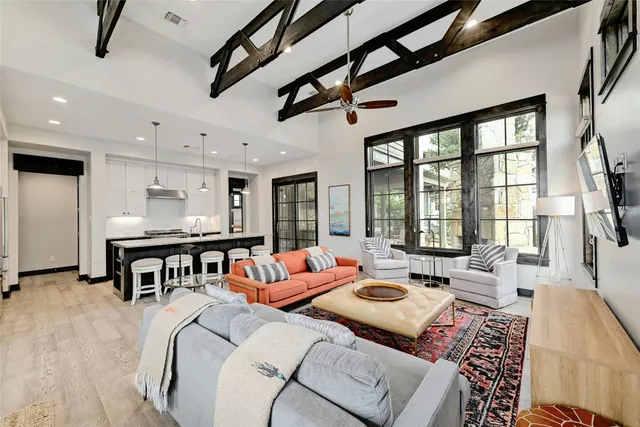 a living room with furniture and a table