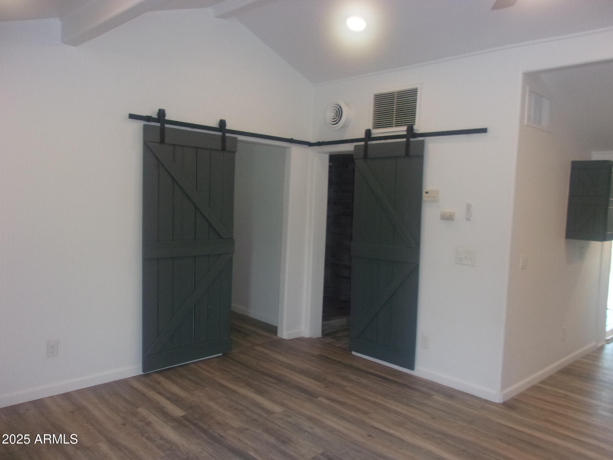4765 East Valley Lane Rimrock, AZ 86335 - Photo 6 of 25 a view of walk in closet with wooden floor