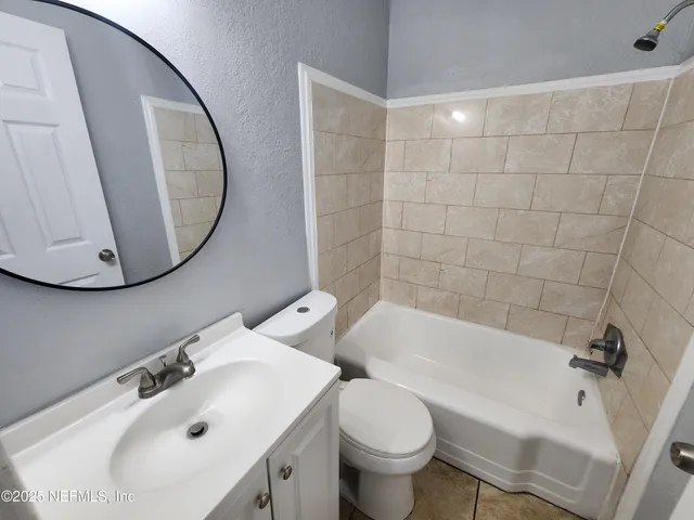 a front view of a house with a garage