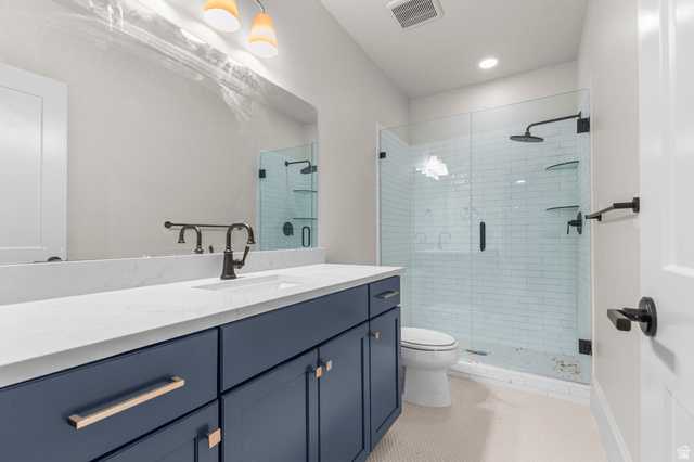 11718 South Halls Crk Road Draper, UT 84020 - Photo 26 of 28 Full bath with vanity, a stall shower, light tile patterned floors, and recessed lighting