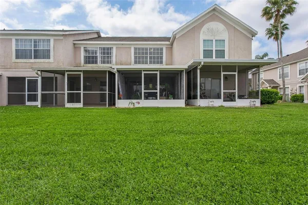 a view of a lake with a big yard