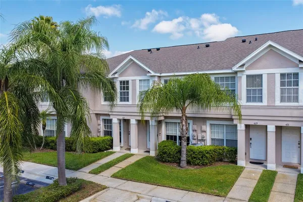 a aerial view of a house with a lake view