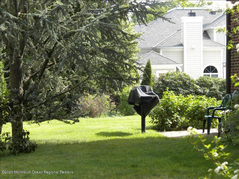 212 Monroe Avenue Spring Lake, NJ 07762 - Photo 9 of 13 a view of a garden