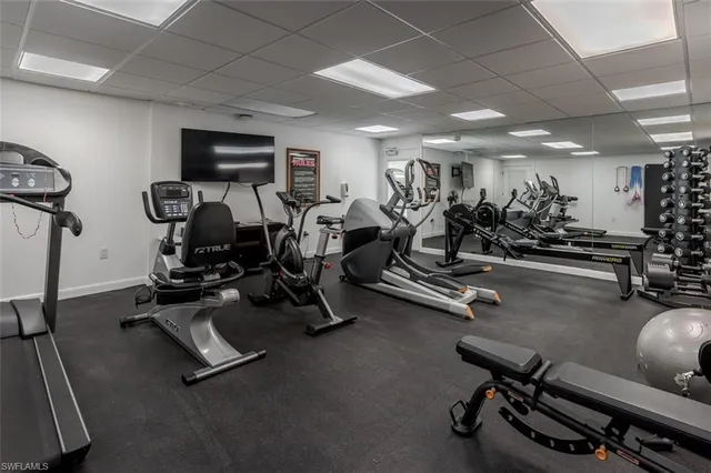 a view of a swimming pool with outdoor seating