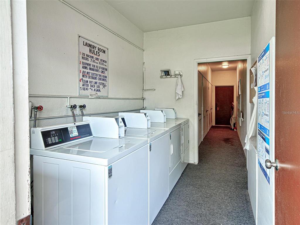 245 Center Road, Unit 104 Venice, FL 34285 - Photo 36 of 37 a utility room with dryer and washer