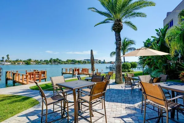 a view of a balcony with chairs