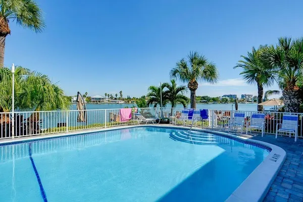 an aerial view of residential house with outdoor space and parking