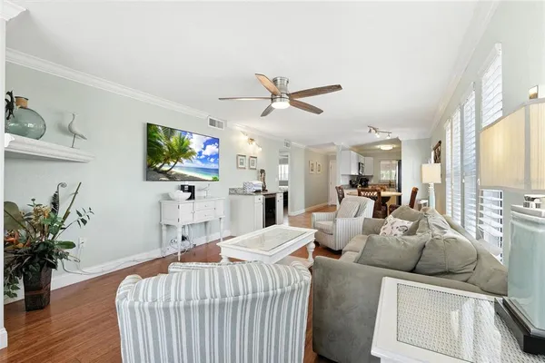 a kitchen with granite countertop a sink a stove and microwave