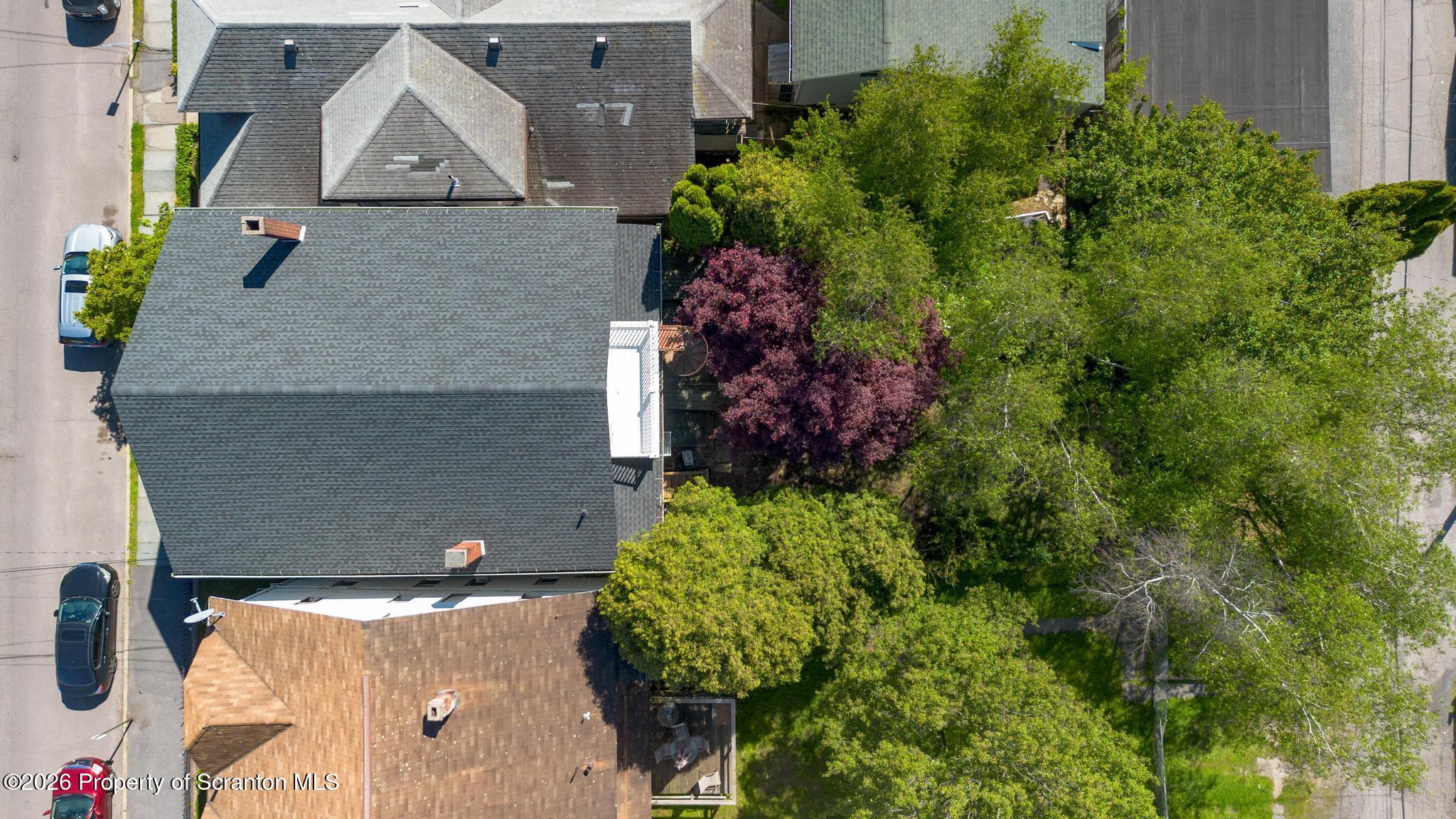 518 Prospect Avenue Scranton, PA 18505 - Photo 5 of 59 an aerial view of a house with a yard and garden