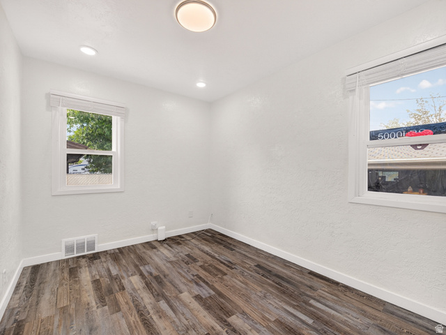 74 South 300 East Springville, UT 84663 - Photo 17 of 48 Room featuring wood-finish flooring, white baseboards, and two windows with white blinds