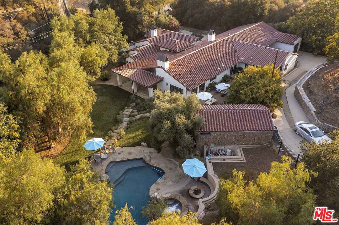 2251 Cold Canyon Road Calabasas, CA 91302 - Photo 4 of 47 a front view of a house with a yard