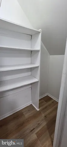 a view of small space with wooden floor