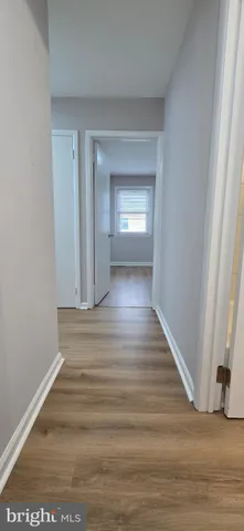 a bathroom with a sink toilet and mirror