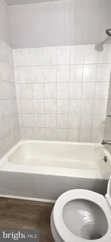 a view of a small space with racks on the wall