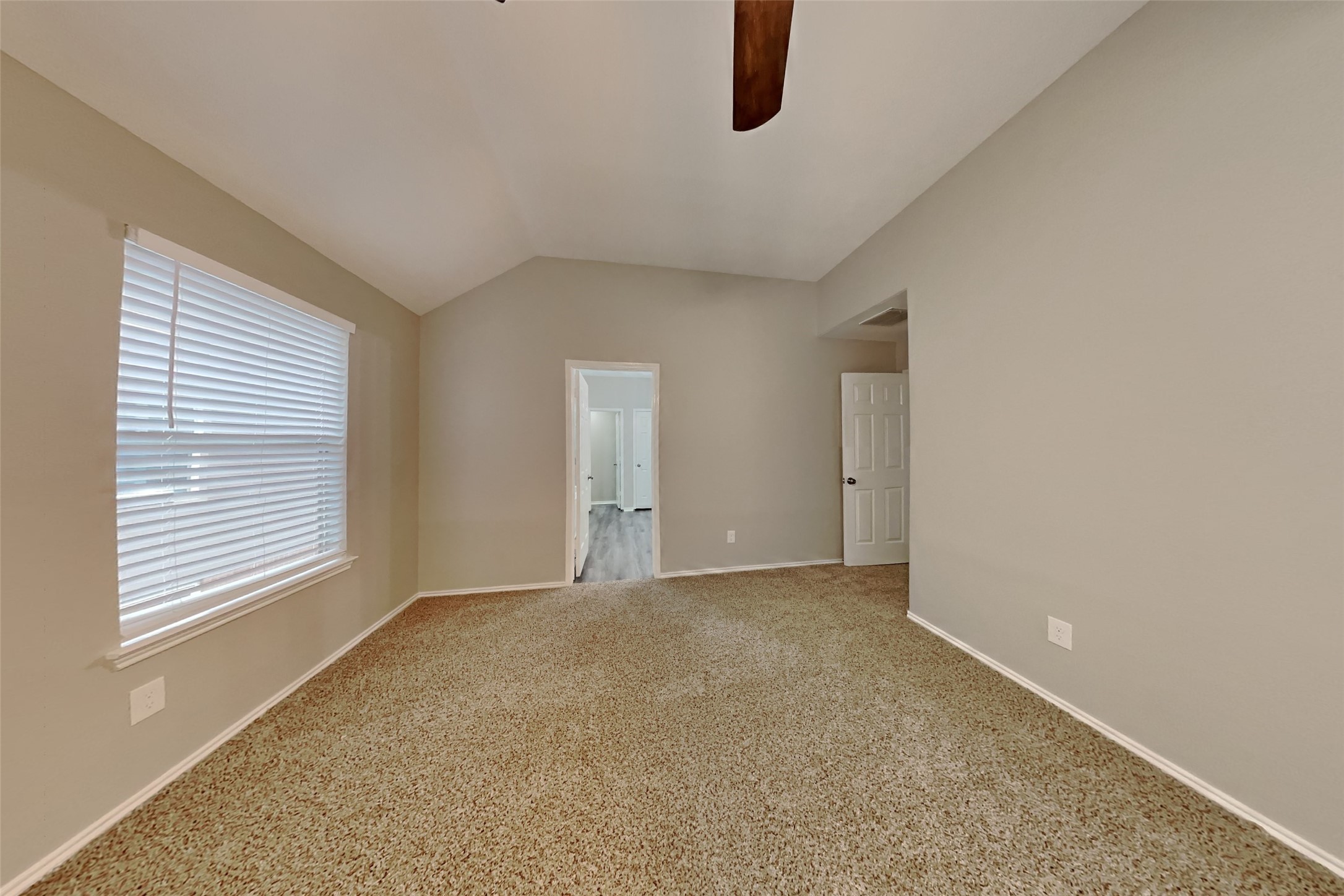 20314 Savannah Bay Road Cypress, TX 77433 - Photo 6 of 21 a view of an empty room with a window