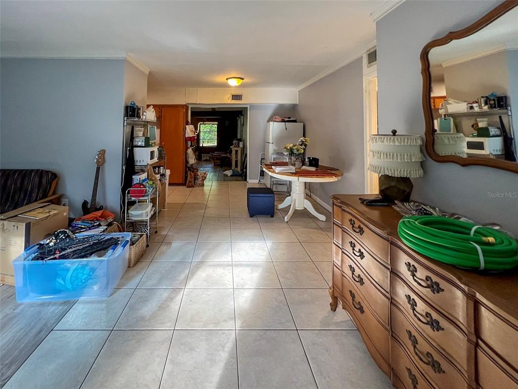630 Northwest 36th Street Gainesville, FL 32607 - Photo 3 of 22 a living room with furniture and a wooden floor
