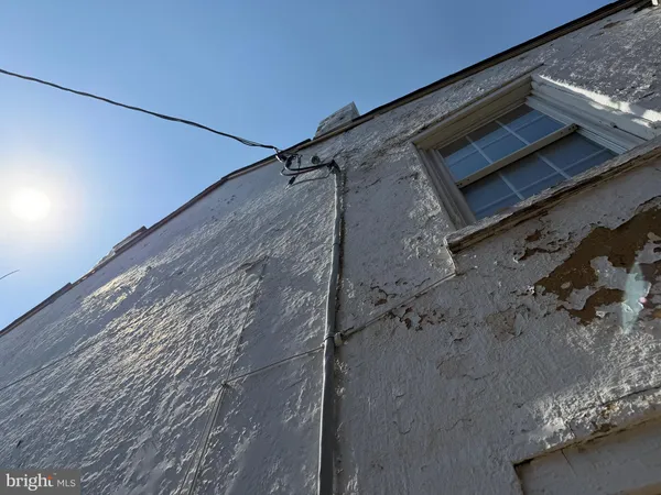 a view of a balcony with car parked