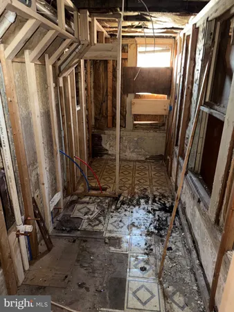 a view of a room with wooden walls