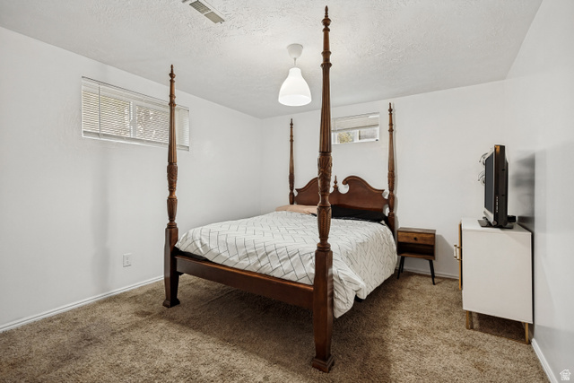1215 8th Street Ogden, UT 84404 - Photo 32 of 39 Bright white walls complemented by textured carpeting
