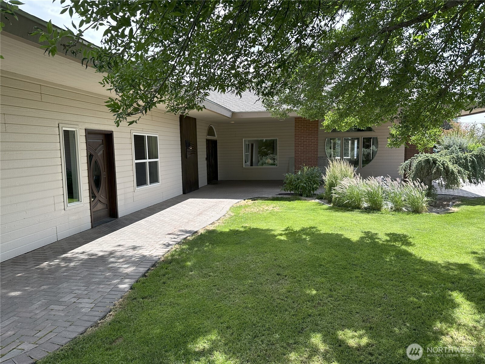 444 Maringo Road Ephrata, WA 98823 - Photo 1 of 1 a front view of house with yard and green space
