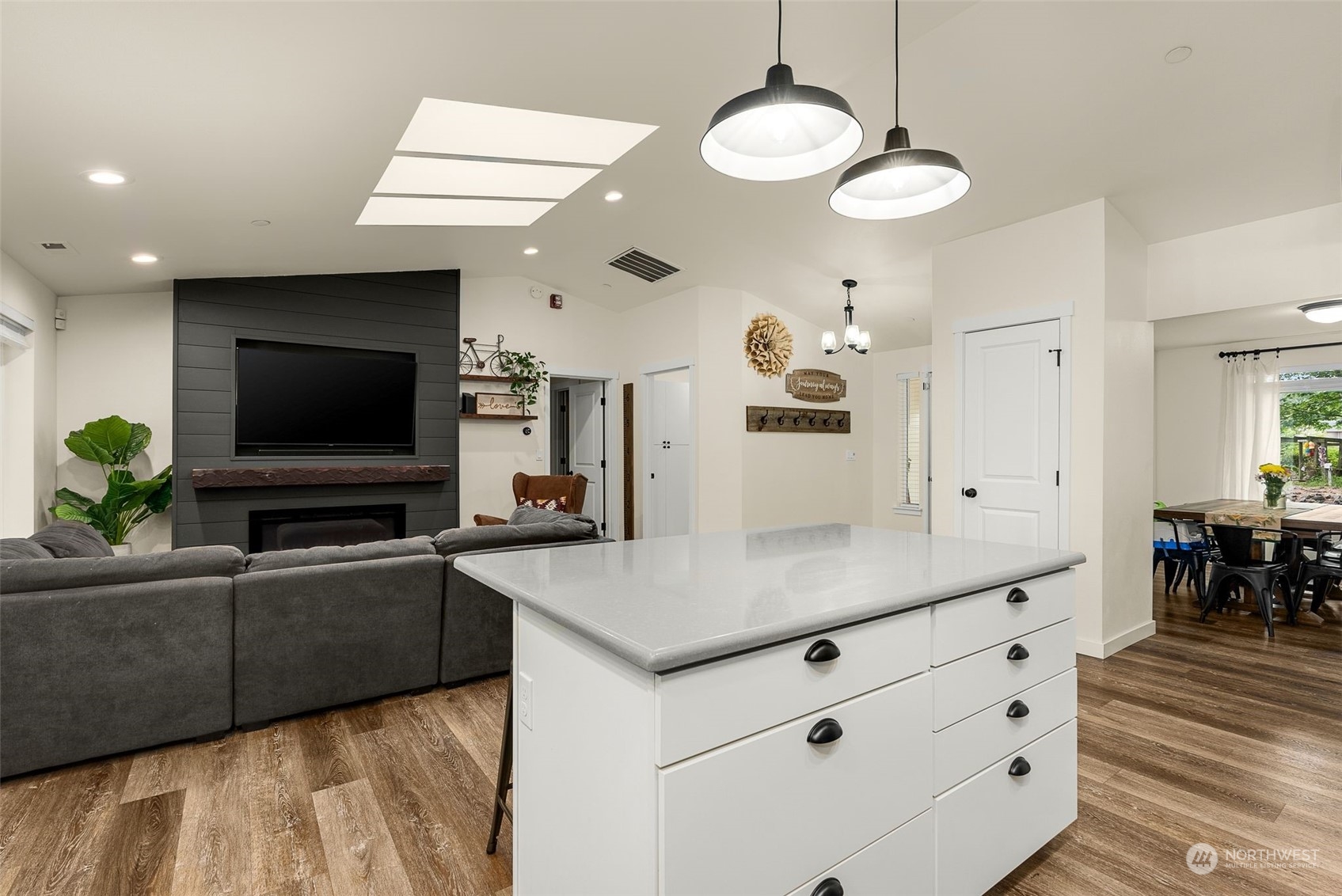 9924 Angeline Road East Bonney Lake, WA 98391 - Photo 13 of 31 a living room with granite countertop furniture and a flat screen tv