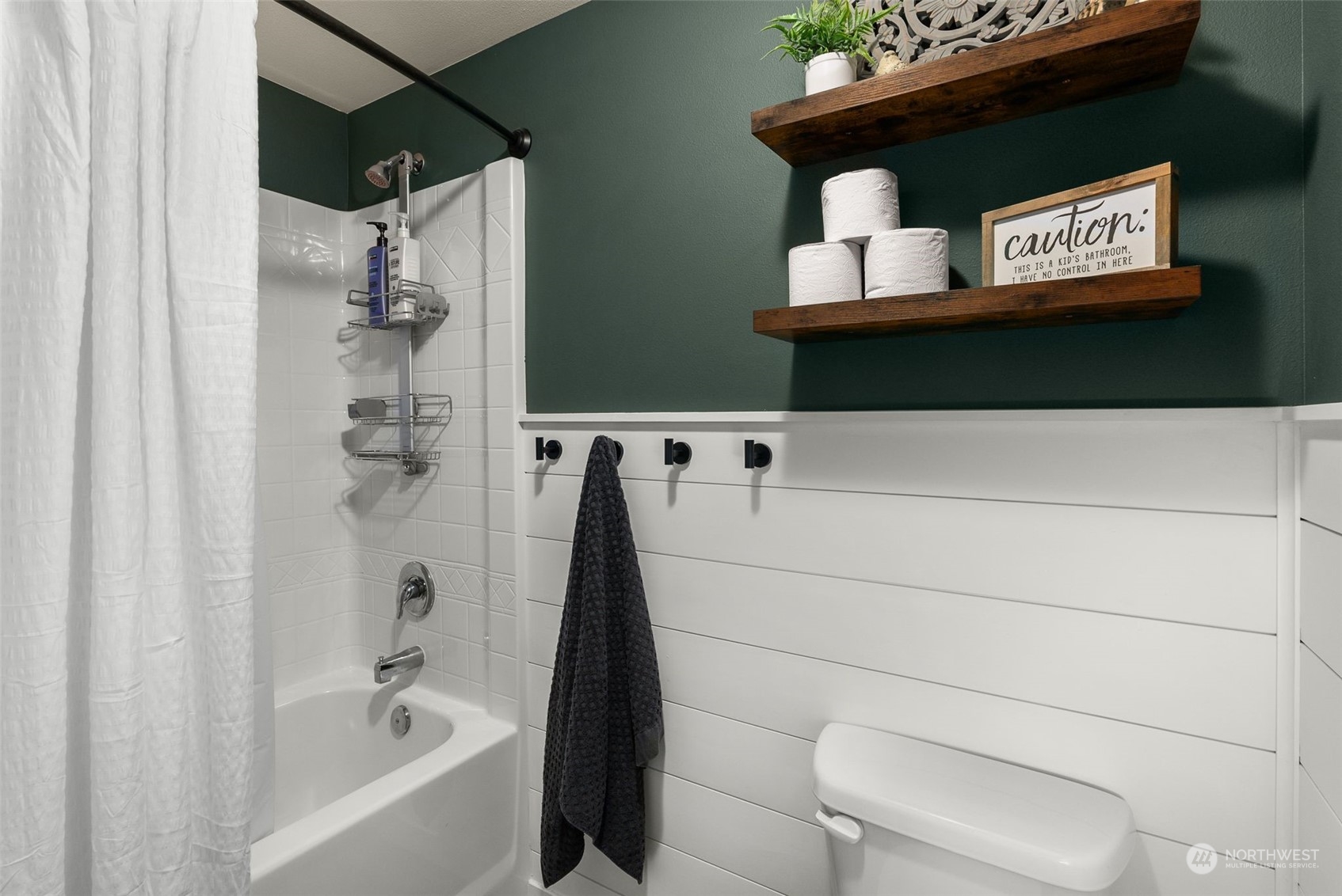 9924 Angeline Road East Bonney Lake, WA 98391 - Photo 18 of 31 a bathroom with a bathtub and a shower