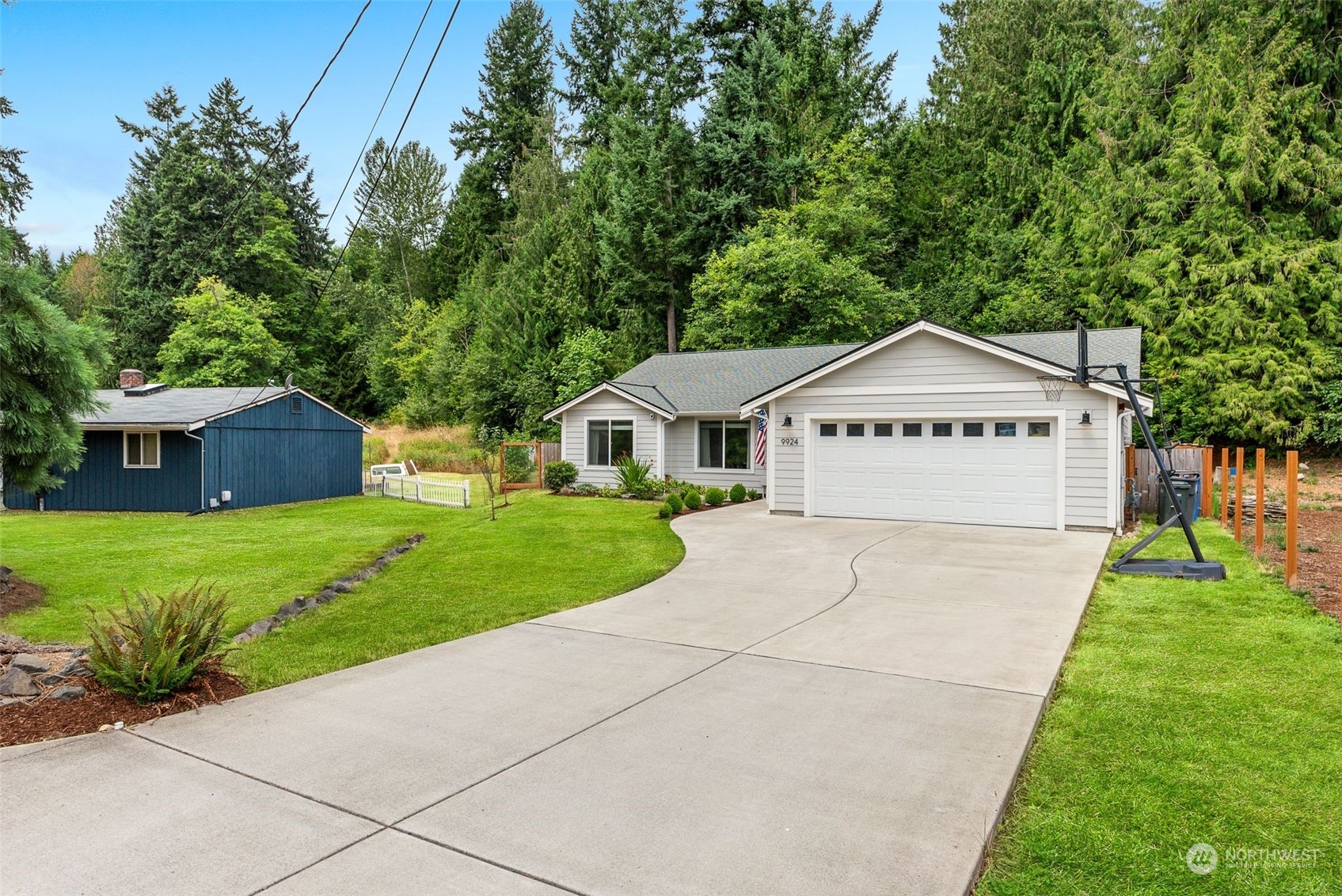 9924 Angeline Road East Bonney Lake, WA 98391 - Photo 2 of 31 a view of a house with a yard