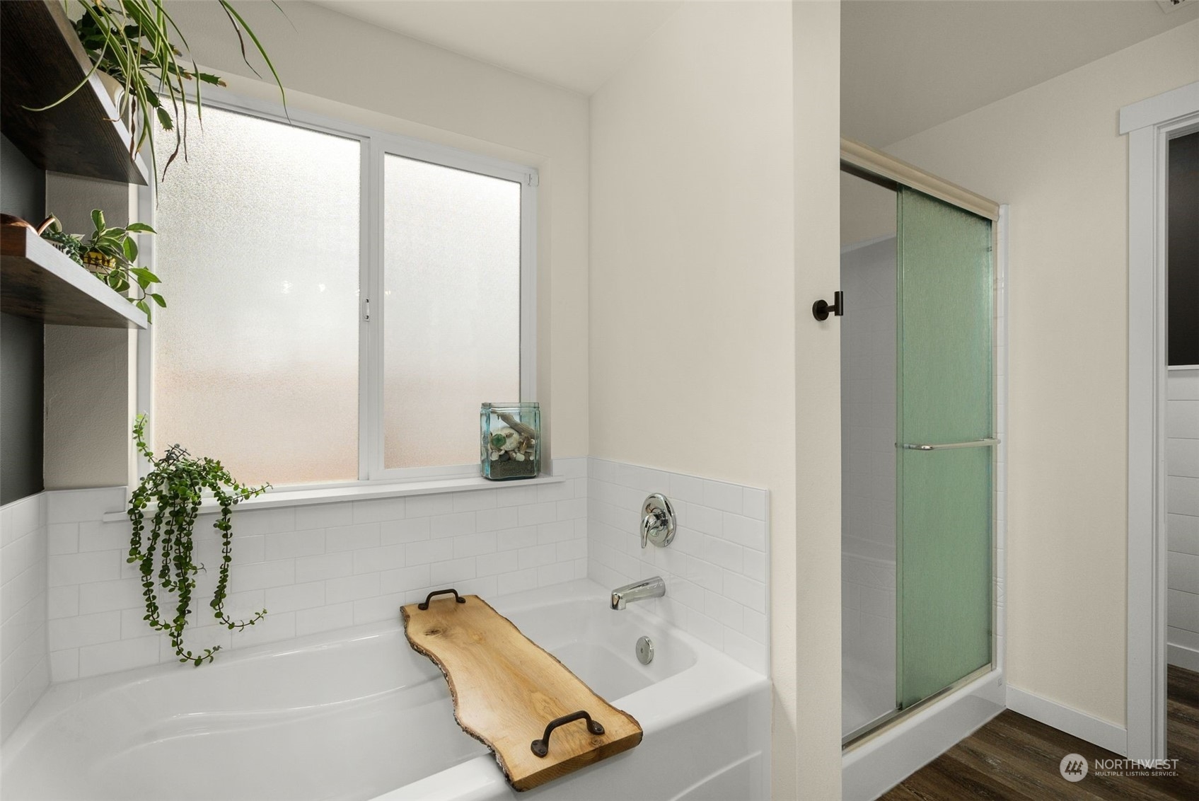 9924 Angeline Road East Bonney Lake, WA 98391 - Photo 25 of 31 a bath tub sitting next to a shower