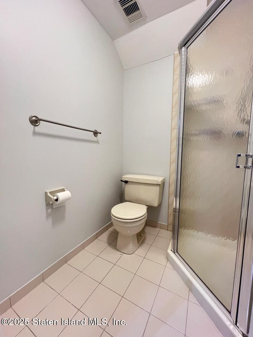 75 Chesebrough Street Staten Island, NY 10312 - Photo 26 of 32 a bathroom with a toilet and a shower