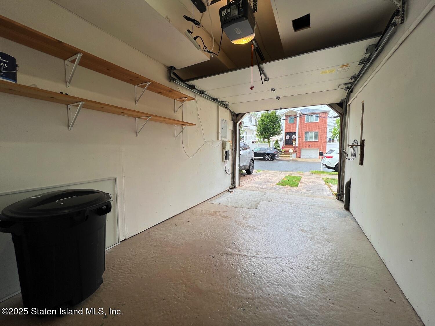 75 Chesebrough Street Staten Island, NY 10312 - Photo 29 of 32 a view of a room with a window and storage