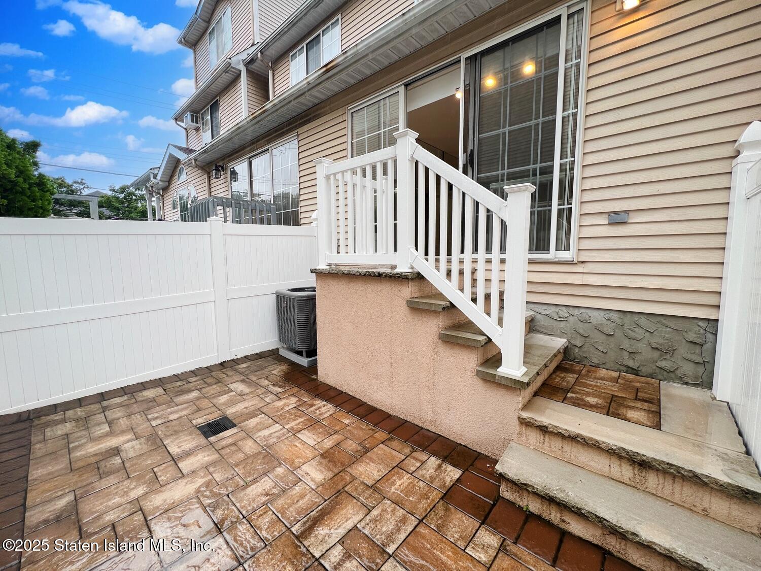 75 Chesebrough Street Staten Island, NY 10312 - Photo 30 of 32 a view of entryway with a front door
