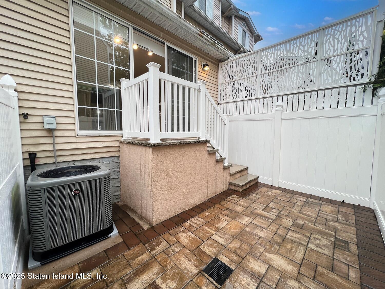 75 Chesebrough Street Staten Island, NY 10312 - Photo 31 of 32 a view of a house with a window