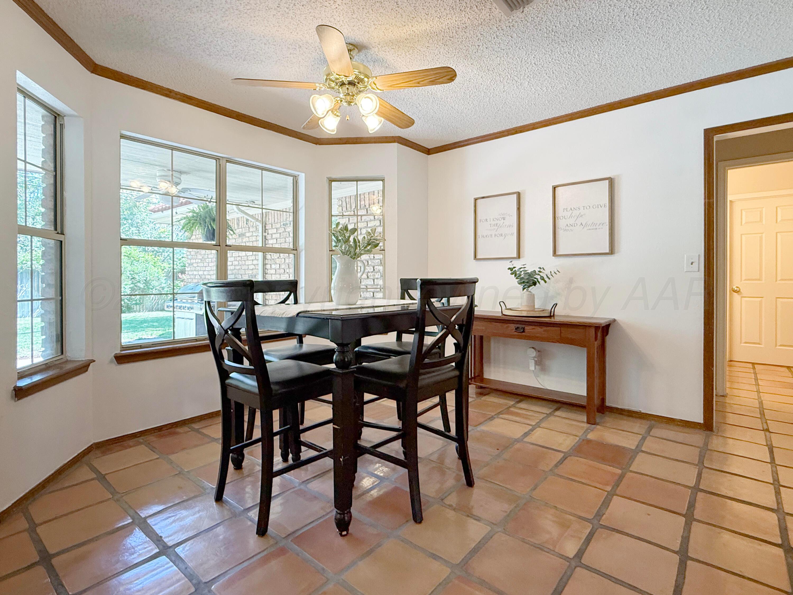 218 West Ocla Street Borger, TX 79007 - Photo 16 of 37 a view of a dining room with furniture and a window