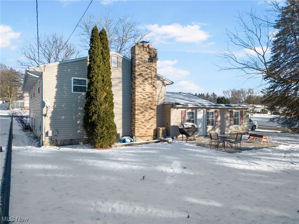 801 Netherwood Avenue Northwest Canton, OH 44708 - Photo 36 of 44 side/back view with a patio area