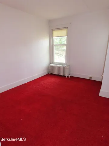 a view of livingroom with furniture and window