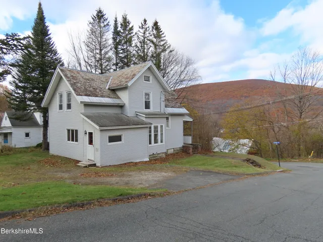 a view of backyard of house
