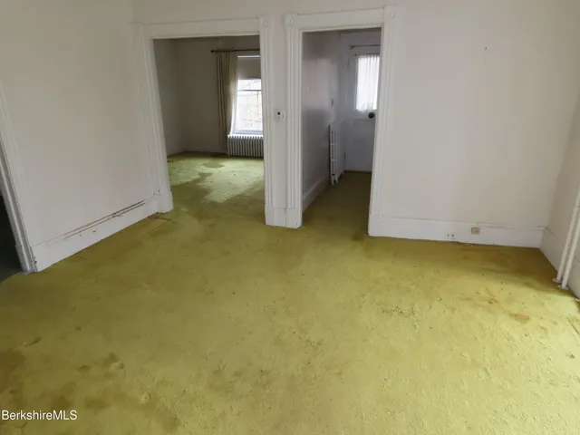 an empty room with closet