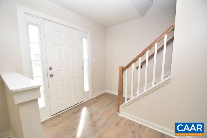 182 Riva Way Palmyra, VA 22963 - Photo 3 of 25 a view of an entryway with wooden floor