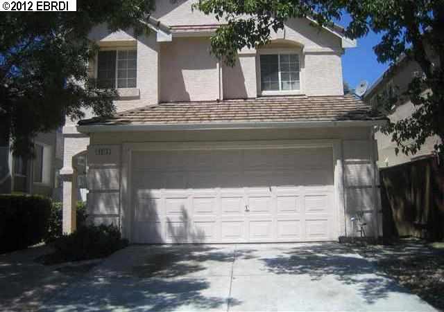 a front view of house with yard