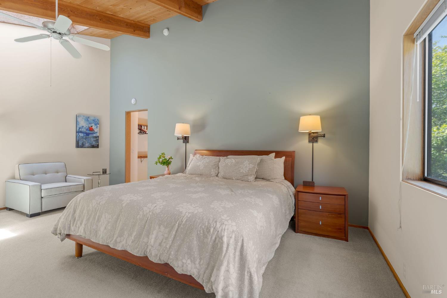 290 Del Mar Point The Sea Ranch, CA 95497 - Photo 27 of 60 a bedroom with a bed and a night stand