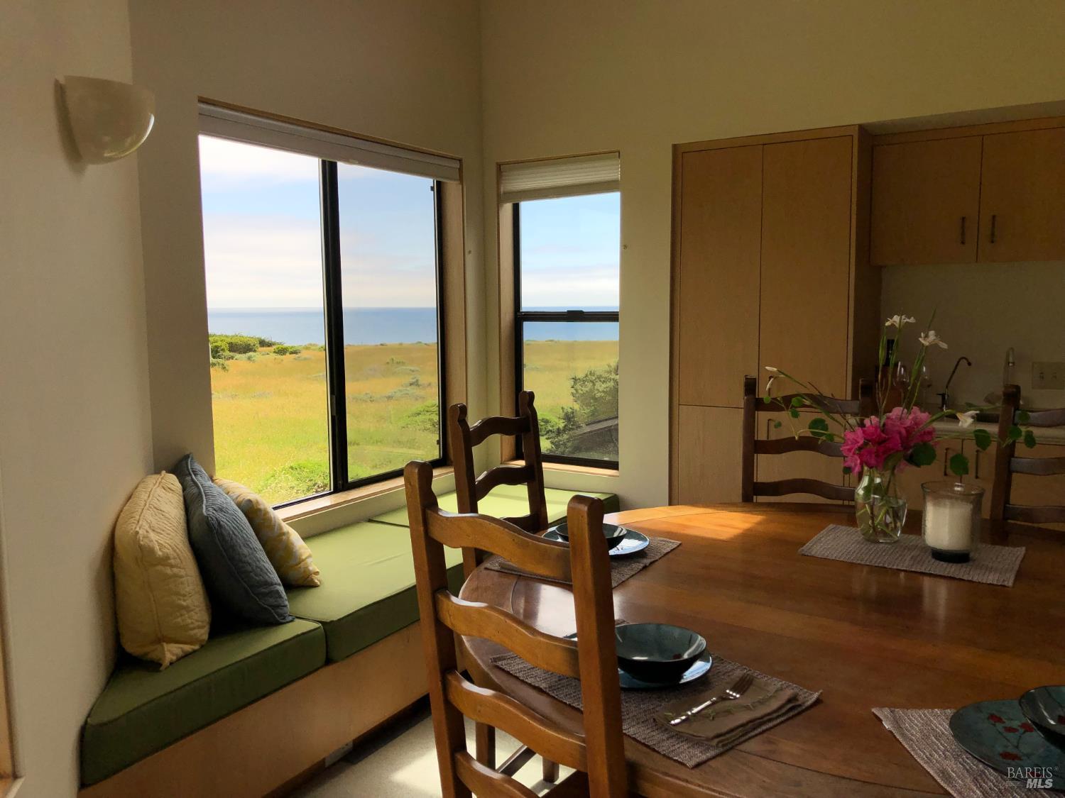 290 Del Mar Point The Sea Ranch, CA 95497 - Photo 60 of 60 a room with furniture water view and a large window