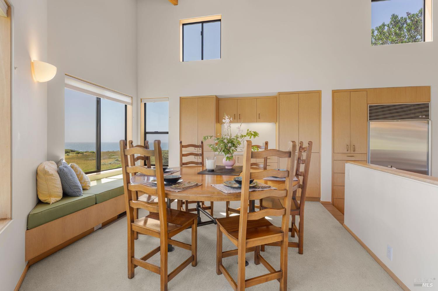 290 Del Mar Point The Sea Ranch, CA 95497 - Photo 8 of 60 a dining room with furniture and wooden floor